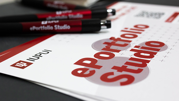 Pens and flyers that read 'IUPUI ePortfolio Studio'