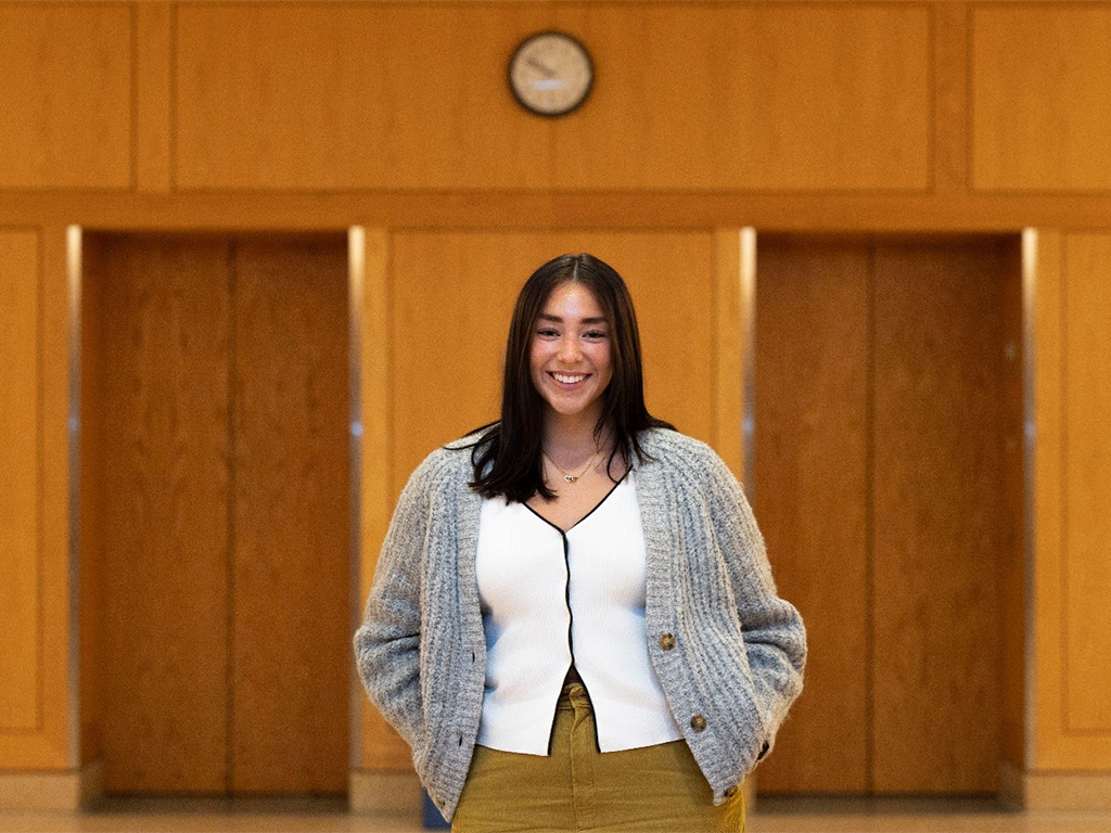 Alexis Leco standing in a room.